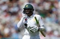 Britain Cricket - England v Pakistan - Third Test - Edgbaston - 7/8/16 Pakistan's Azhar Ali walks off dejected after losing his wicket to England's Moeen Ali Action Images via Reuters / Paul Childs