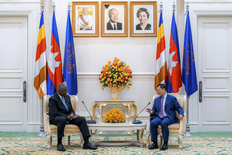 In this photo released by Agence Kampuchea Press (AKP), U.S. Defense Secretary Lloyd Austin, left, meets with Cambodian Prime Minister Hun Manet in Phnom Penh, Cambodia, Tuesday, June 4, 2024. Austin traveled to Cambodia on Tuesday to push for stronger military ties with China’s closest ally in Southeast Asia. (AKP via AP)