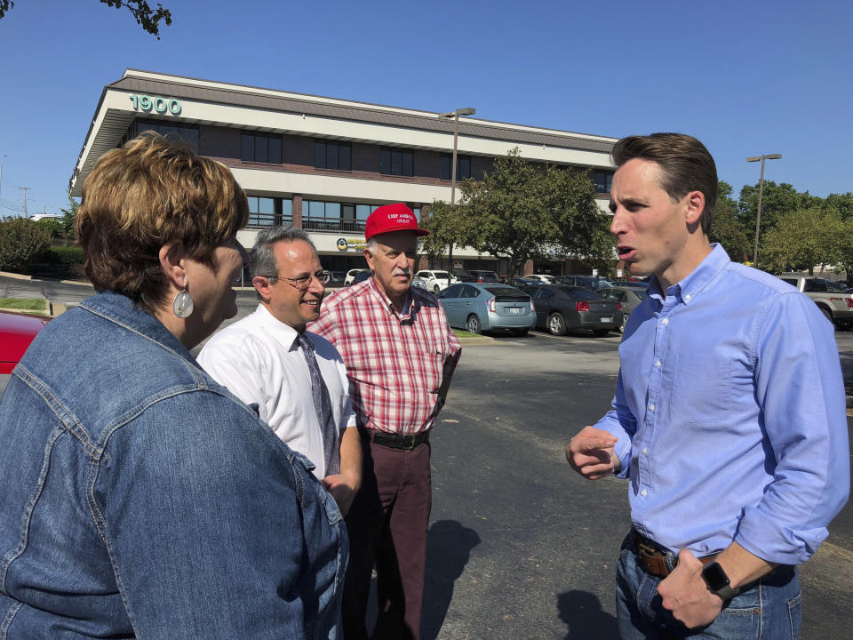 In this Sept. 12, 2018, photo, Missouri GOP Attorney General Josh Hawley speaks to voters during a stop in Columbia, Mo. Hawley is trying to unseat Democratic Sen. Claire McCaskill. (AP Photo/Sara Burnett)