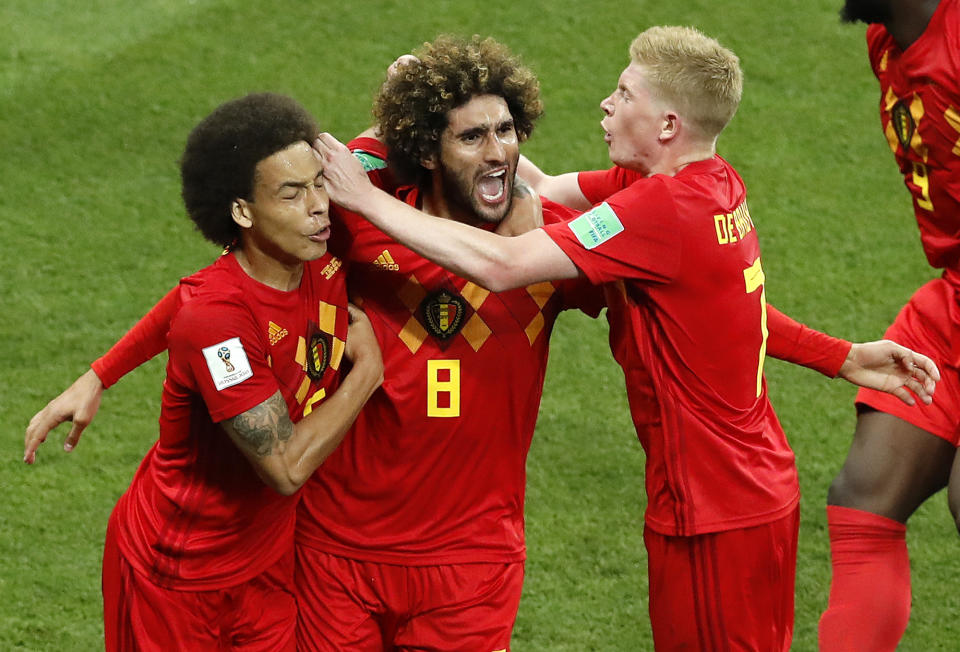 Belgium’s Marouane Fellaini, center, celebrates with teammates after scoring his second side goal during the round of 16 match between Belgium and Japan at the 2018 soccer World Cup in the Rostov Arena, in Rostov-on-Don, Russia, Monday, July 2, 2018. (AP Photo/Hassan Ammar)