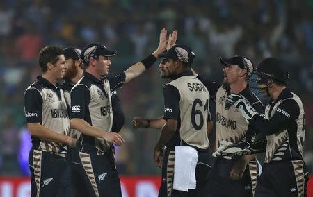 Cricket - England v New Zealand - World Twenty20 cricket tournament semi-final - New Delhi, India - 30/03/2016. New Zealand's players celebrate the dismissal of England's Alex Hales. REUTERS/Adnan Abidi