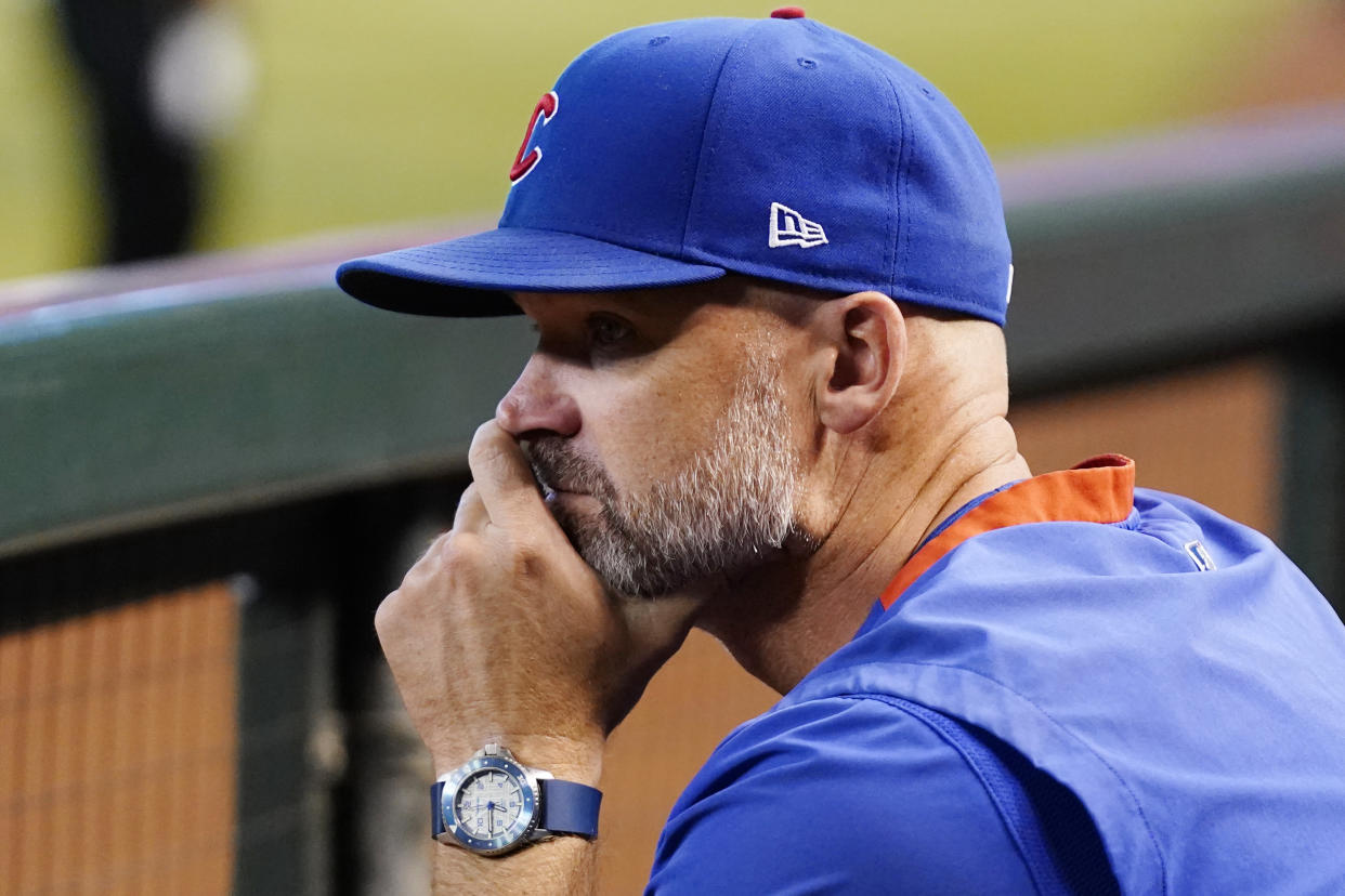 Chicago Cubs manager David Ross pauses in the dugout prior to a baseball game against the Arizona Diamondbacks Saturday, Sept. 16, 2023, in Phoenix. (AP Photo/Ross D. Franklin)