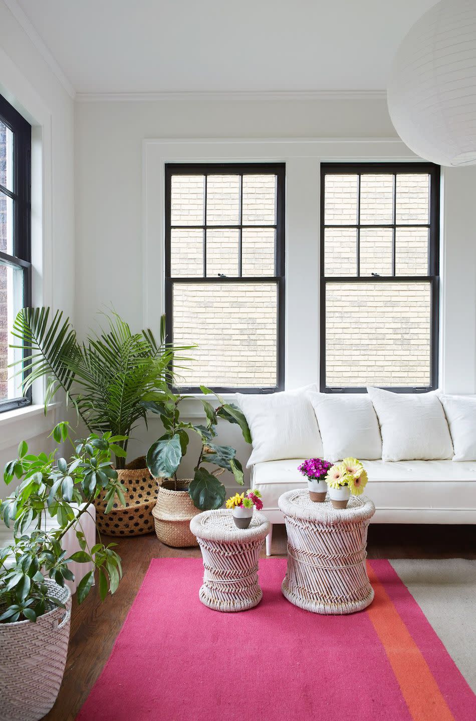 <p>Have a radiator in your home that sticks out like a sore thumb? You're not alone. Fortunately, there are many ways to cover that bad boy up. Here, designer Leanne Ford surrounded the radiator with a cluster of houseplants — which not only complements the room's laid-back design, but it makes the radiator a lot less visible.</p><p> Don't have houseplants? You can try sliding a table over it or rearranging other furniture pieces to mask it. We've rounded up our best tips for covering up radiators <a href="https://www.housebeautiful.com/home-remodeling/interior-designers/g27922083/radiator-cover-ideas/" rel="nofollow noopener" target="_blank" data-ylk="slk:here;elm:context_link;itc:0;sec:content-canvas" class="link ">here</a>.</p>