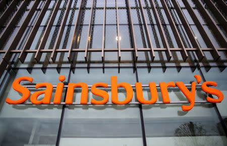 A sign is displayed outside a Sainsbury's store in London, Britain December 3, 2015. REUTERS/Neil Hall/File Photo