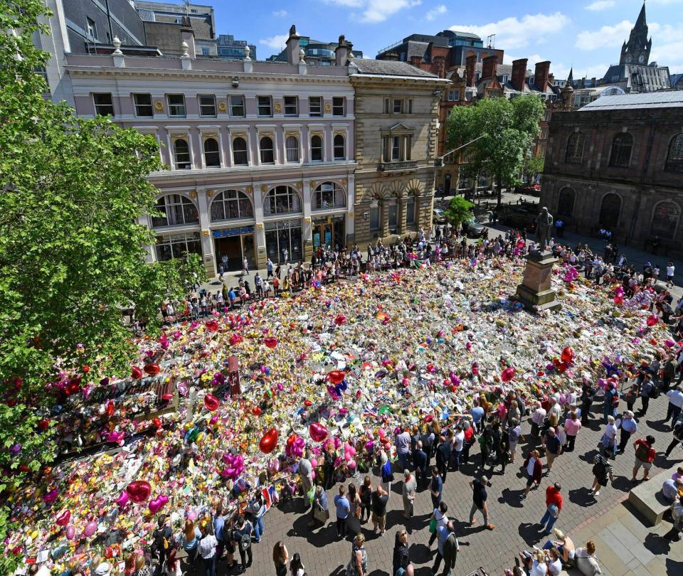Tributes fill St Ann's Square, Manchester after the Manchester Arena Bombing