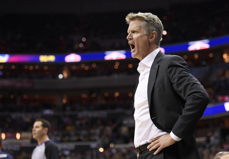 Golden State Warriors coach Steve Kerr yells during the first half of the teame’s NBA basketball game against the Washington Wizards, Wednesday, Feb. 28, 2018, in Washington. (AP Photo/Nick Wass)