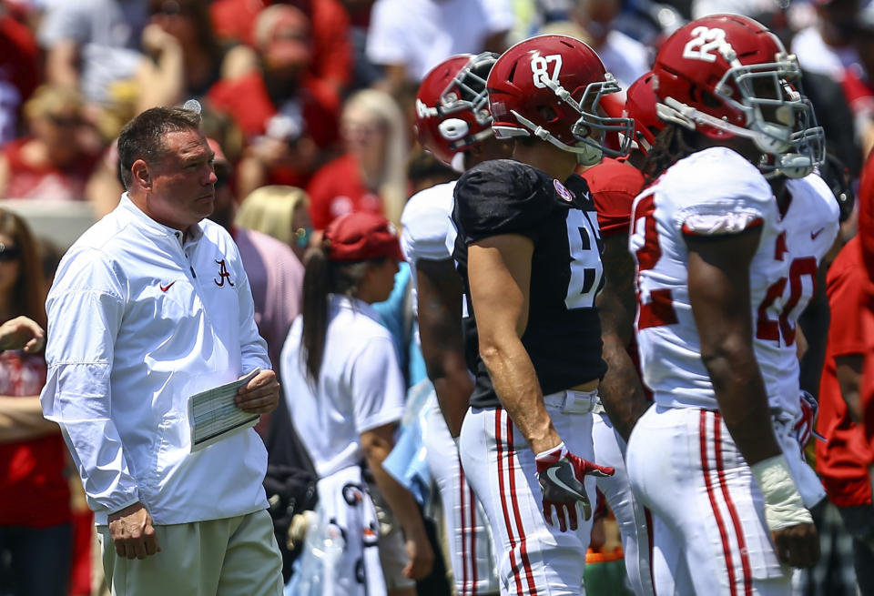 Former Tennessee coach Butch Jones, now an analyst for Alabama, watches from the sidelines during a college football game, Saturday, April 21, 2018, in Tuscaloosa, Ala. (AP Photo/Butch Dill)