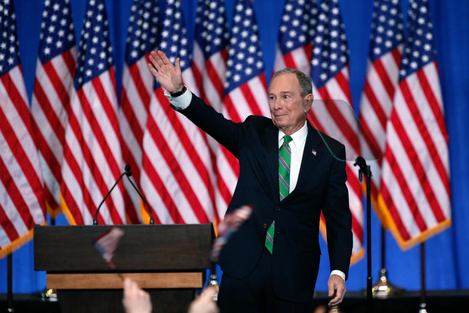 Former Democratic presidential candidate Mike Bloomberg waves to supporters as he announces the suspension of his campaign and his endorsement of former Vice President Joe Biden for president in New York Wednesday , March 4, 2020. (AP Photo/Eduardo Munoz Alvarez)