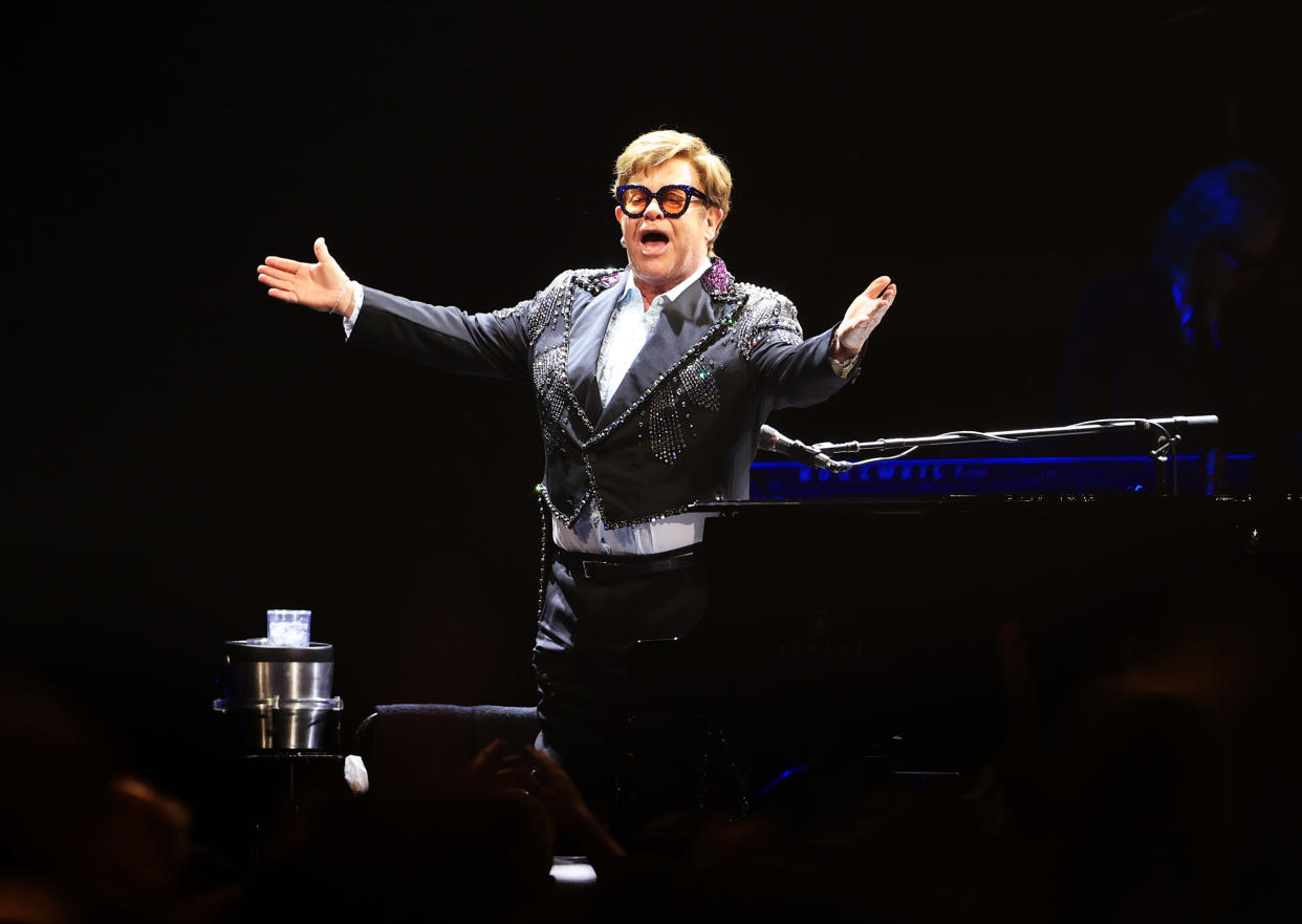 LIVERPOOL, ENGLAND - MARCH 23: (EDITORIAL USE ONLY) Elton John performs during the first UK stop on his 