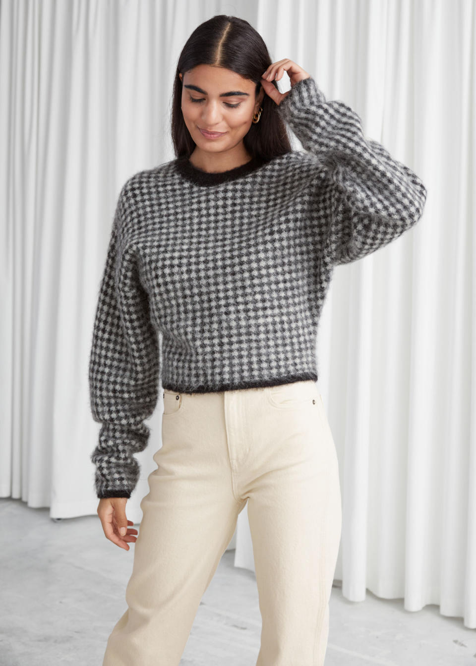 Thanks to "The Queen's Gambit," checkerboard prints have made a comeback. If they've been lusting over the series' fashion, this sweater will be a checkmate. <a href="https://fave.co/33IzLpD" target="_blank" rel="noopener noreferrer">Find it for $99 at &amp; Other Stories</a>. 