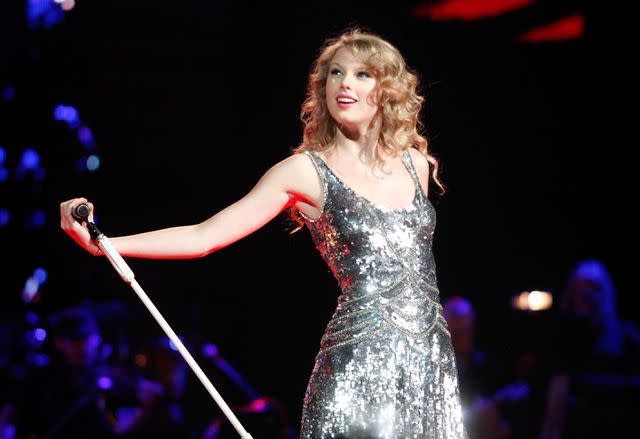 <p>Ed Rode/Nashville Rising/Getty</p> Taylor Swift