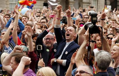 People react as Ireland voted in favour of allowing same-sex marriage in a historic referendum, in Dublin May 23, 2015. REUTERS/Cathal McNaughton