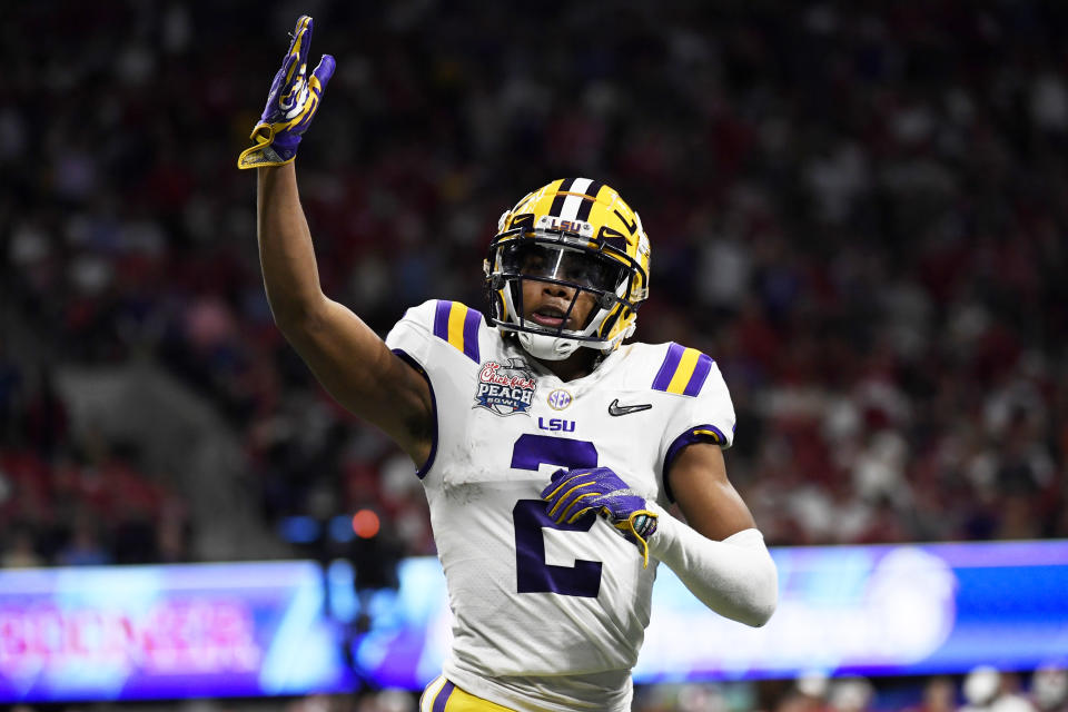 LSU wide receiver Justin Jefferson (2) celebrates his touchdown against Oklahoma during the first half of the Peach Bowl NCAA semifinal college football playoff game, Saturday, Dec. 28, 2019, in Atlanta. LSU won 63-28. (AP Photo/Danny Karnik)