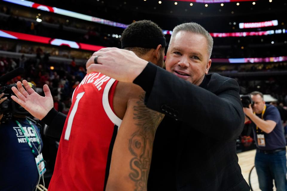 Ohio State's head coach Chris Holtmann hugs Roddy Gayle Jr. (1) after an NCAA college basketball game against Iowa at the Big Ten men's tournament, Thursday, March 9, 2023, in Chicago. Ohio State won 73-69. (AP Photo/Erin Hooley)