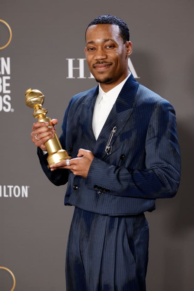 Tyler James Williams poses with the award for Best Supporting Actor - Television Series for "Abbott Elementary" in the press room during the 80th Annual Golden Globe Awards at The Beverly Hilton on Jan. 10, 2023, in Beverly Hills, California.<p><a href="https://www.gettyimages.com/detail/1455635314" rel="nofollow noopener" target="_blank" data-ylk="slk:Frazer Harrison/Getty Images;elm:context_link;itc:0;sec:content-canvas" class="link ">Frazer Harrison/Getty Images</a></p>