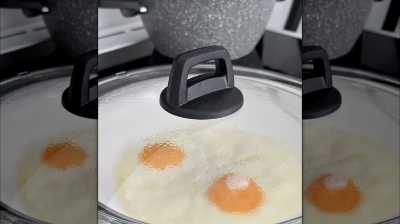 Eggs in pan with lid