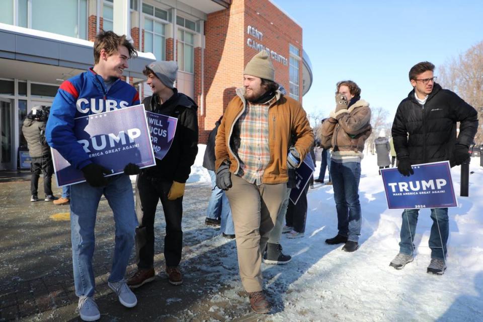 People emerge from the Kent Campus Center at Simpson College after attending a rally where former President Donald Trump spoke on Sunday, Jan 14, 2023, in Indianola, IA.