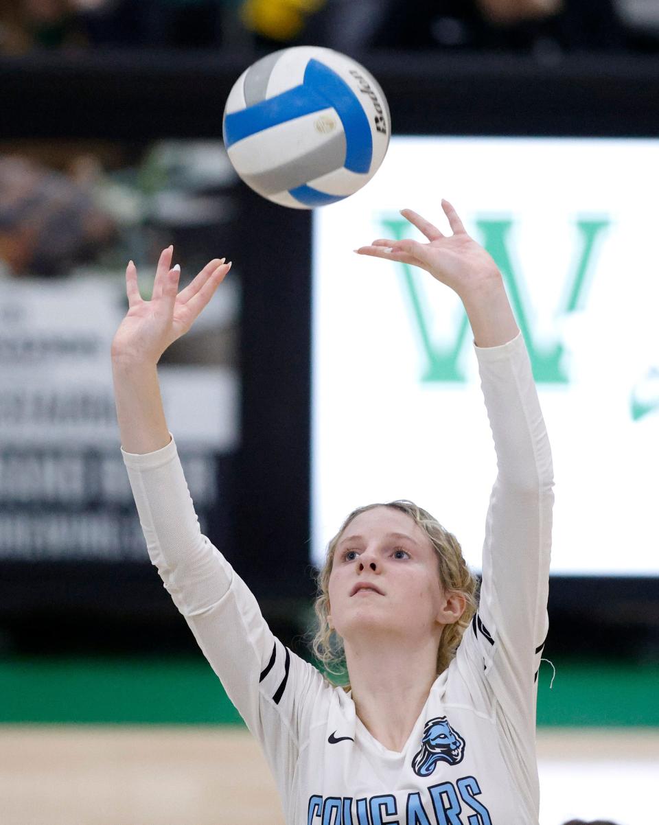 Lansing Catholic's Bella Lewis sets against Tecumseh, Tuesday, Nov. 8, 2022, in Williamston.