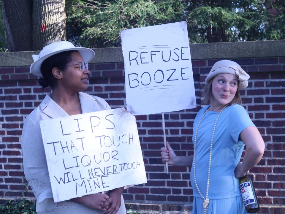 Dani Lyons, left, and Liz Zimmerman prepare to perform at the "Bootlegger's Bash" at the Studebaker National Museum and The History Museum on April 26, 2024, on the museums' campus. The actors are members of the theater group Shades of Orange.