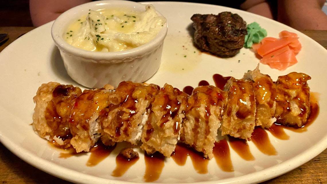 A 4.5 oz. filet with a crab rangoon roll ($36.99) and a side of Yukon gold whipped potatoes at Malone’s first restaurant location in the Lansdowne Shoppes on Tates Creek Road.