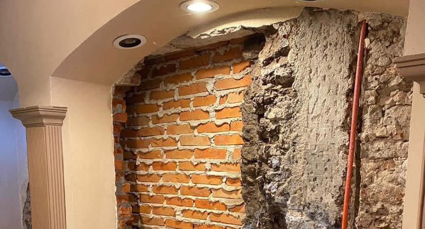 A brick wall found behind a hidden door in a Mexican house.