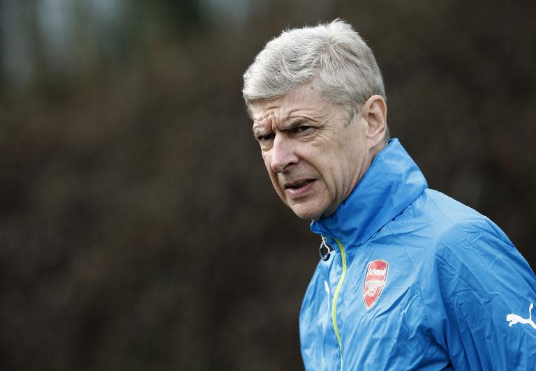 Arsenal's manager Arsene Wenger during a training session at the club's complex at London Colney on March 16, 2015