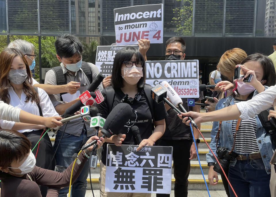 Hong Kong Alliance in Support of Patriotic Democratic Movements of China Vice Chairperson Chow Hang-tung speaks to media outside a court in Hong Kong, Thursday, May 6, 2021. High-profile Hong Kong activist Joshua Wong will face an additional 10 months in jail for participating in an unauthorized Tiananmen vigil held last year to commemorate the 1989 crackdown on protesters in Beijing, as Hong Kong authorities continue tightening control over dissent in the city. (AP Photo/Rafael Wober)