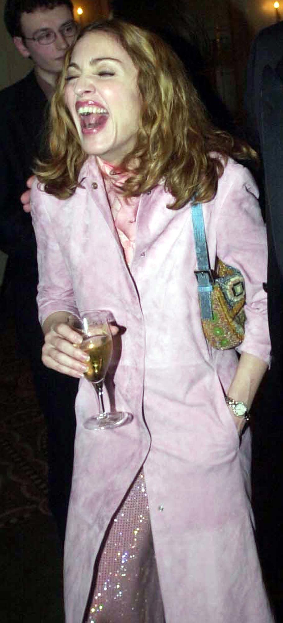 We're not sure what this pink coat is, exactly, but we're glad she's having a nice time wearing it.