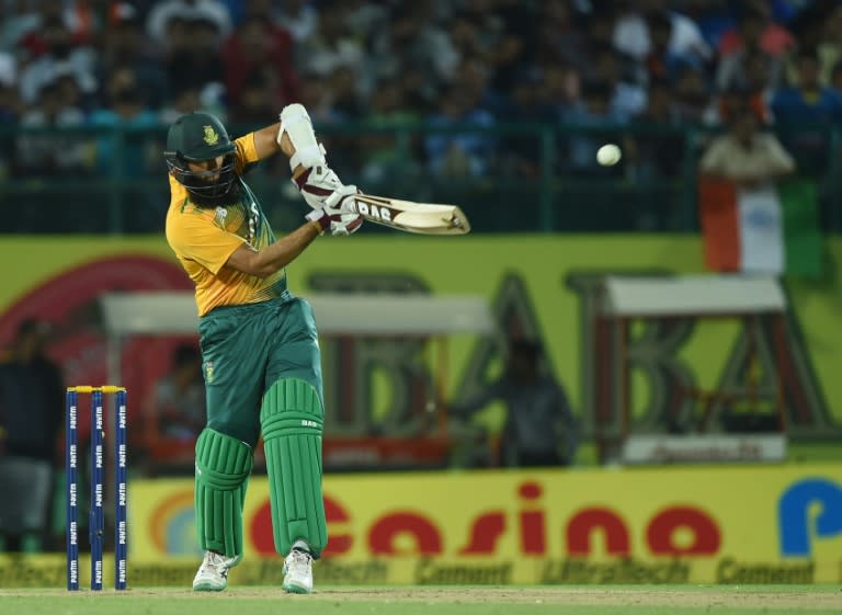 South Africa's Hashim Amla plays a shot during the first T20 cricket match between India and South Africa at The Himachal Pradesh Cricket Association Stadium in Dharamsala on October 2, 2015