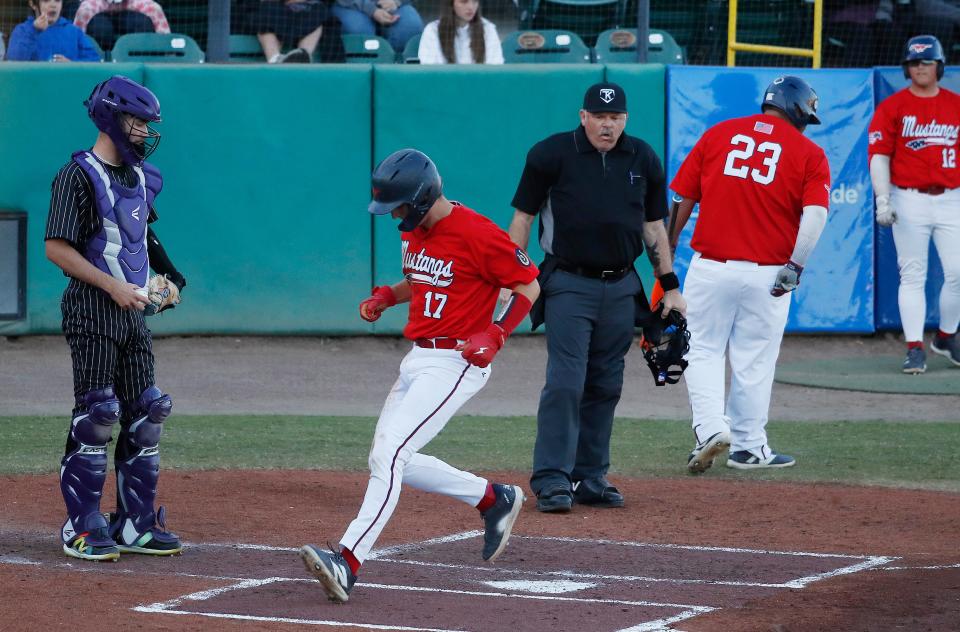 Tulare Western's Blake Crawford scores the first run on a balk against Mission Oak during their West Yosemite League high school baseball game at RawhideÕs Valley Strong Ballpark in Visalia, Calif., Thursday, March 14, 2024.