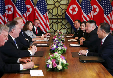 North Korea's leader Kim Jong Un and U.S. President Donald Trump attend the extended bilateral meeting in the Metropole hotel with U.S. Secretary of State Mike Pompeo, White House national security adviser John Bolton, acting White House Chief of Staff Mick Mulvaney, North Korean Foreign Minister Ri Yong Ho and Kim Yong Chol, Vice Chairman of the North Korean Workers' Party Committee, during the second North Korea-U.S. summit in Hanoi, Vietnam February 28, 2019. REUTERS/Leah Millis