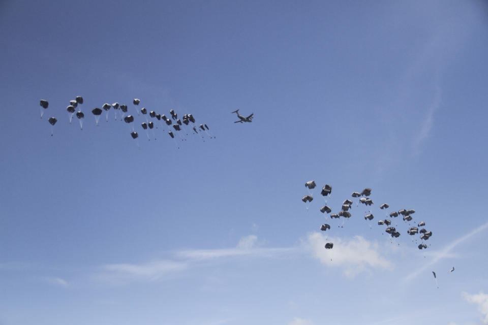 Humanitarian aid is airdropped to Palestinians over Gaza City, Gaza Strip, Monday, March 25, 2024. (AP Photo/Mahmoud Essa)