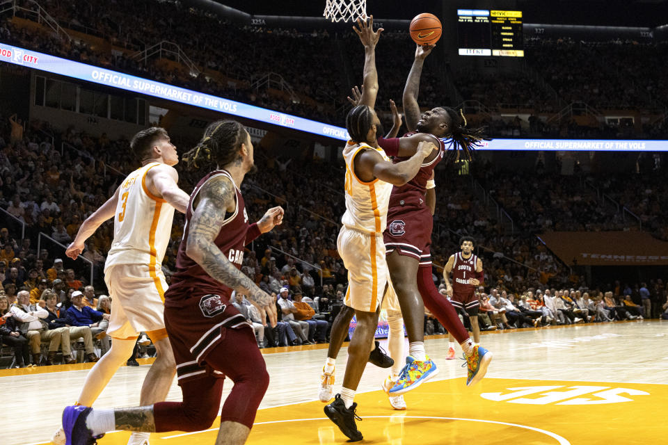 South Carolina forward B.J. Mack (2) shoots over Tennessee guard Josiah-Jordan James (30) during the second half of an NCAA college basketball game Tuesday, Jan. 30, 2024, in Knoxville, Tenn. (AP Photo/Wade Payne)