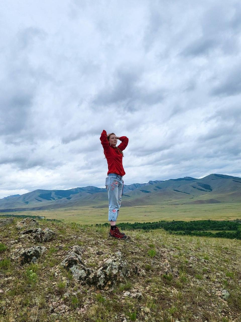 Nipomo native and Peace Corps volunteer Claire Bodger stands in the wildnerness near her home in the Arkhangai Province of Mongolia. Bodger splits her time roughly 50-50 between teaching English language classes and running an environmental education program.