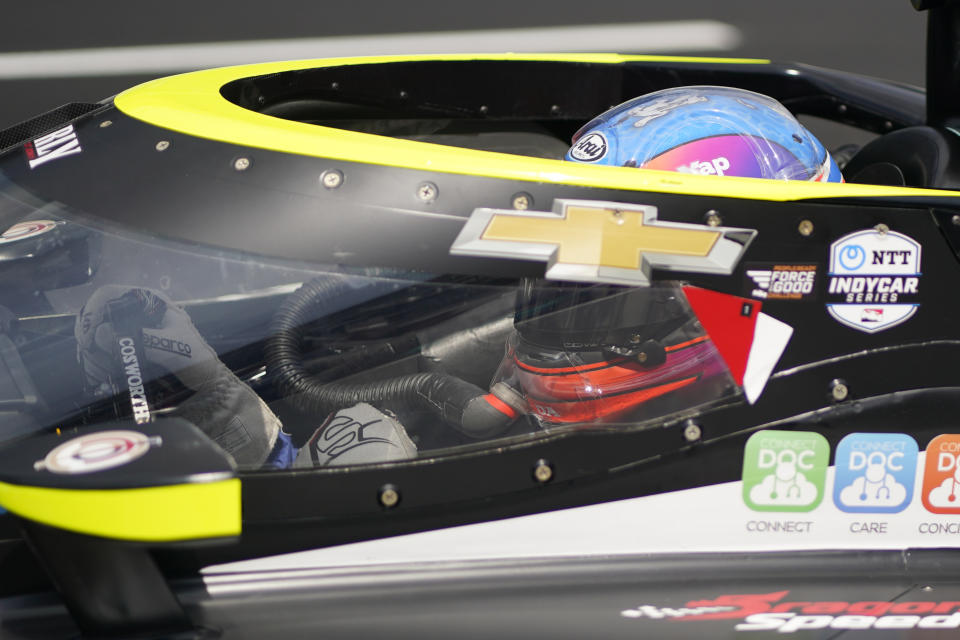 Stefan Wilson, of England, leaves the pits during practice for the Indianapolis 500 auto race at Indianapolis Motor Speedway, Thursday, May 19, 2022, in Indianapolis. (AP Photo/Darron Cummings)