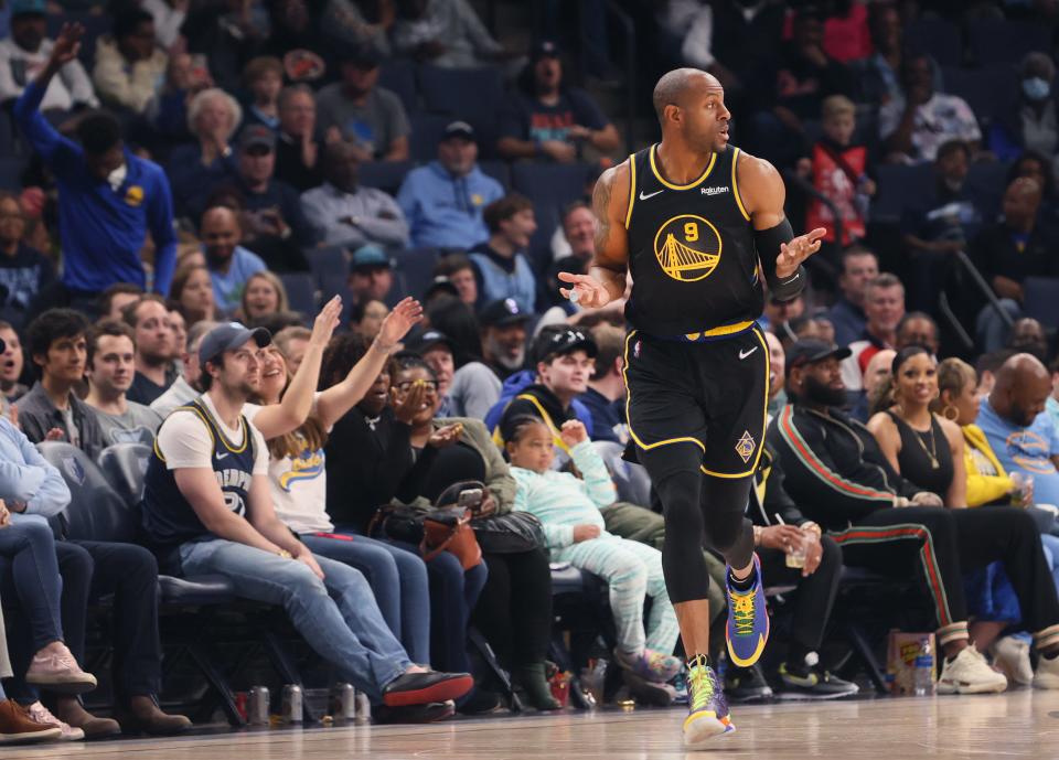 Golden State Warriors forward Andre Iguodala shrugs after hitting a 3-pointer as the Memphis Grizzlies fans boo him at FedExForum on Monday, March 28, 2022.  