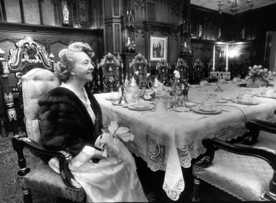 In this May 1, 1988, photo, Mother Divine sits in the dining room of her Woodmont estate in Gladwyn, Pa. Born Edna Rose Ritchings, the widow of Father Divine and leader for decades of a religious movement he founded that advocated racial equality and provided free food to thousands of people has died in Pennsylvania. Mother Divine was believed to be 92. Emil J. Ciavarelli Family Funeral Homes said Mother Divine died Saturday, March 4, 2017, at the movement's Gladwyne estate. (Michael Mercanti/The Philadelphia Inquirer via AP)