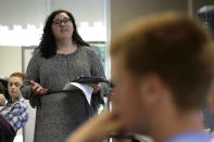 In this photo taken Tuesday, May 21, 2019, social sciences teacher Kasey Turcol teaches 11th grade students about the D-Day invasion at Normandy during a history class at Crossroads FLEX school in Cary, N.C. Turcol has just 75 minutes to explain to her high school students the importance of D-Day - and if this wasn’t the 75th anniversary of the turning point in World War II, she wouldn’t devote that much time to it. (AP Photo/Gerry Broome)