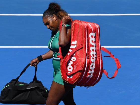 Williams leaves the court after her defeat (EPA)