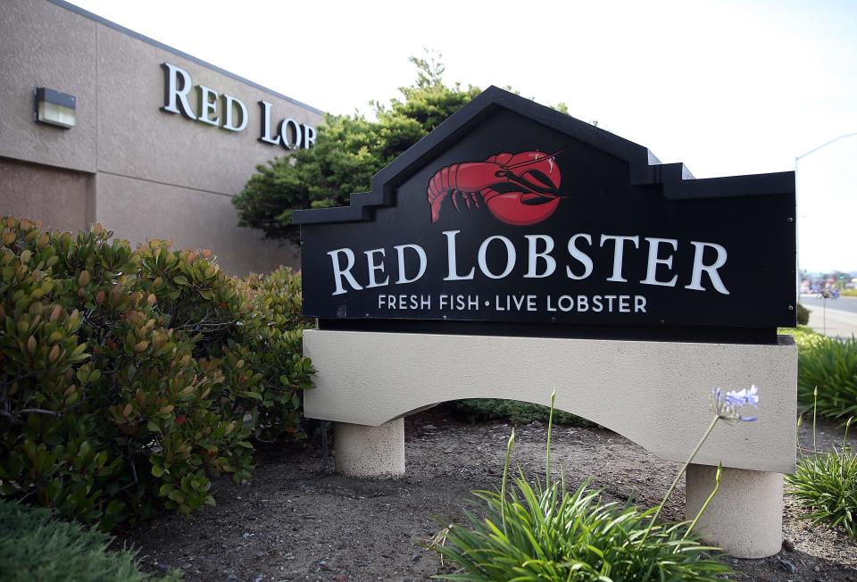A sign is posted in front of a Red Lobster restaurant on May 16, 2014 in San Bruno, California.