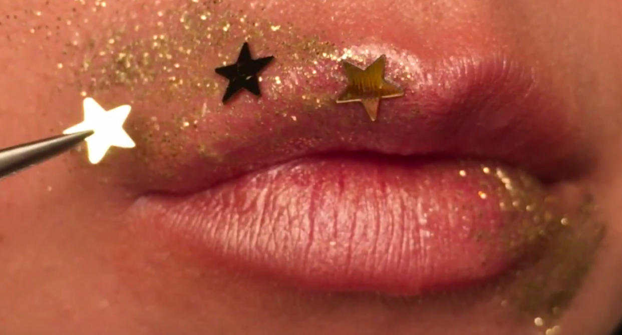 Try out this easy lip-art look for your New Year’s Eve party. (Photo: YouTube/Lip Art Ideas)