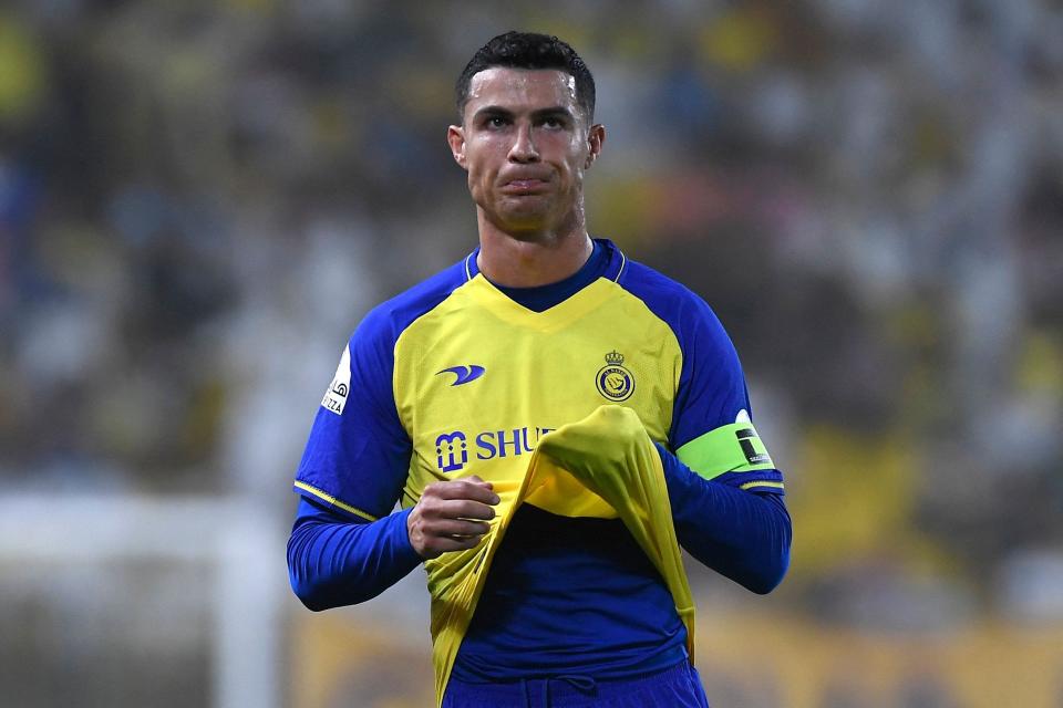 Soccer star Cristiano Ronaldo reacts during the Saudi Pro League football match between Al-Nassr and Al-Raed at the al-Awwal Park Stadium in Riyadh on April 28, 2023.