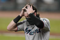 Miami Marlins' Brian Anderson reacts after striking out in the eight inning of a baseball game against the Atlanta Braves Wednesday, Sept. 23, 2020, in Atlanta. (AP Photo/John Bazemore)