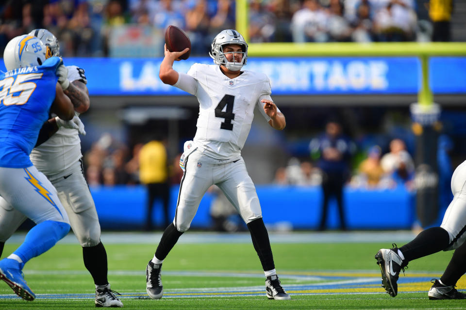 Oct 1, 2023; Inglewood, California, USA; Las Vegas Raiders quarterback Aidan O’Connell (4) throws against the Los Angeles Chargers during the second half at SoFi Stadium. Mandatory Credit: Gary A. Vasquez-USA TODAY Sports