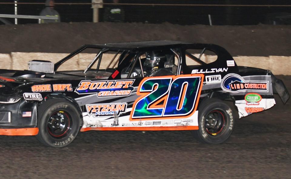 Pontiac's Tanner Sullivan (20) cruised to his first win in the 15-lap stock car race.