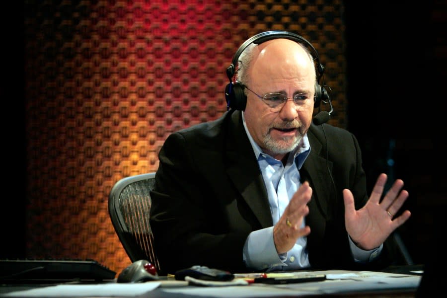 Financial talk show host Dave Ramsey works in his broadcast studio in Brentwood, Tenn., on Thursday, March 23, 2006. (AP Photo/Mark Humphrey)