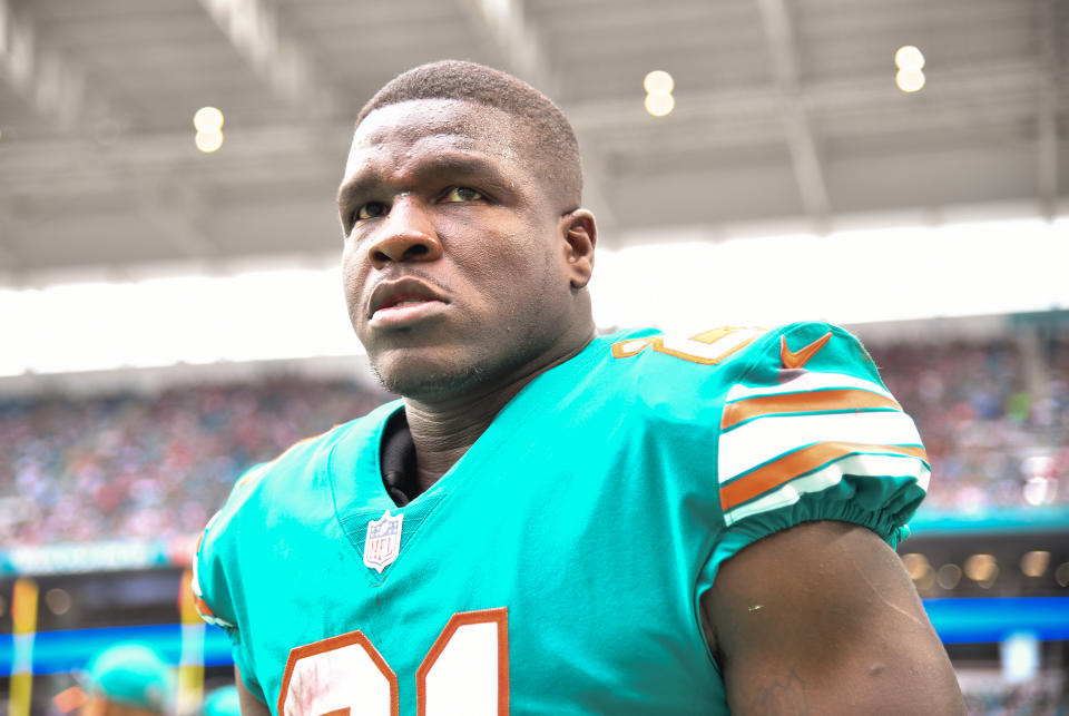 MIAMI, FL - DECEMBER 09: Frank Gore #21 of the Miami Dolphins in action against the New England Patriots at Hard Rock Stadium on December 9, 2018 in Miami, Florida. (Photo by Mark Brown/Getty Images)