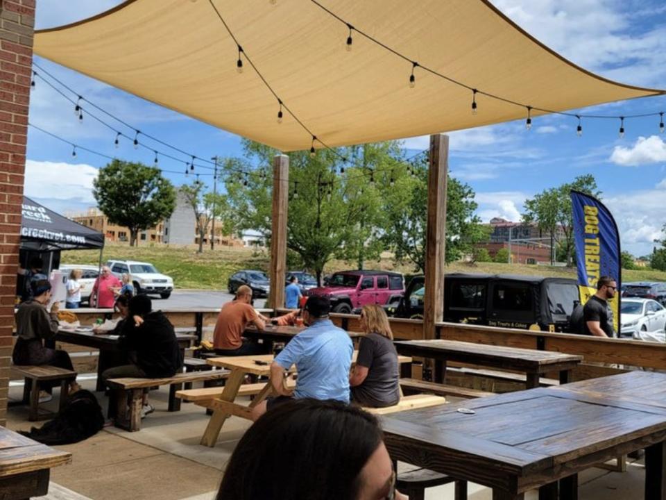 Outdoor seating at Armored Cow Brewing