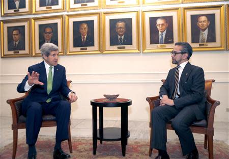 U.S. Secretary of State John Kerry (L) talks with Indonesia's Foreign Minister Marty Natalegawa at the Foreign Ministry office before a meeting in Jakarta February 17, 2014. REUTERS/Adi Weda/Pool