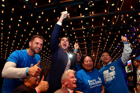 Australia's Liberal Party supporters react during the results count at the Federal Liberal Reception at the Sofitel-Wentworth hotel in Sydney, Australia, May 18, 2019. AAP Image/Mick Tsikas/via REUTERS